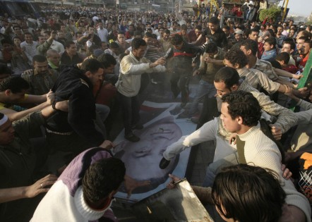 ​Mahalla citizens smash Mubarak's poster, 7 April 2008, Photo taken by Nasser Nouri