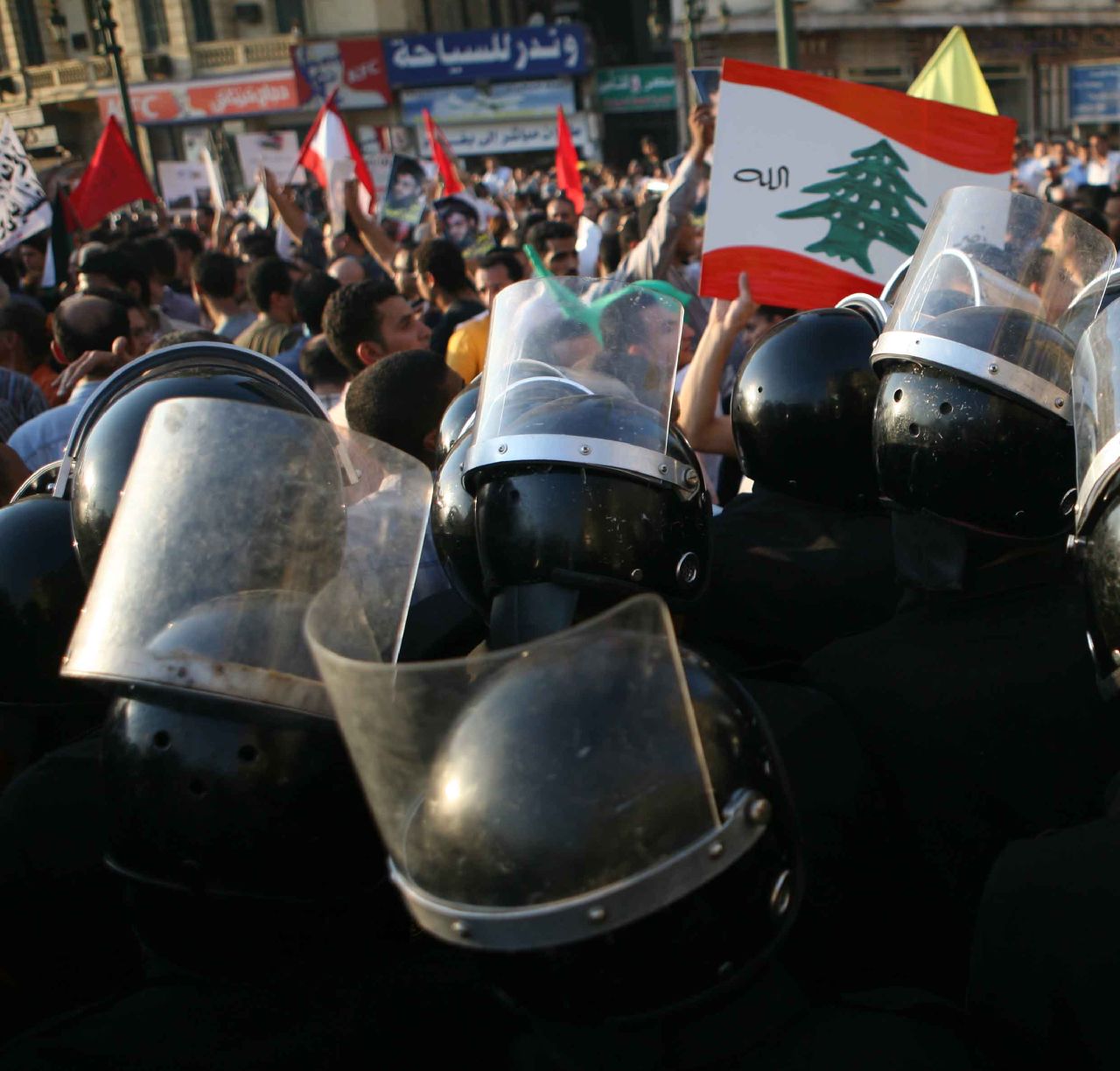 CSF troops in Tahrir Square formed a second circle around the plainclothes thugs, squashing protesters inside (Photo by Amr Abdallah, 26 July 2006)