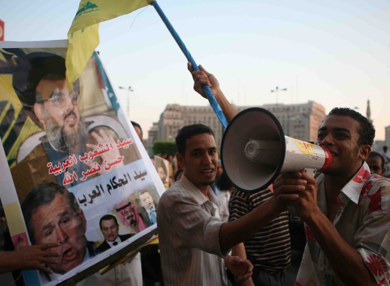Pro-Hizballah demonstrator chanting, marching towards Tahrir Sq (Photo by Amr Abdallah, 26 July 2006)