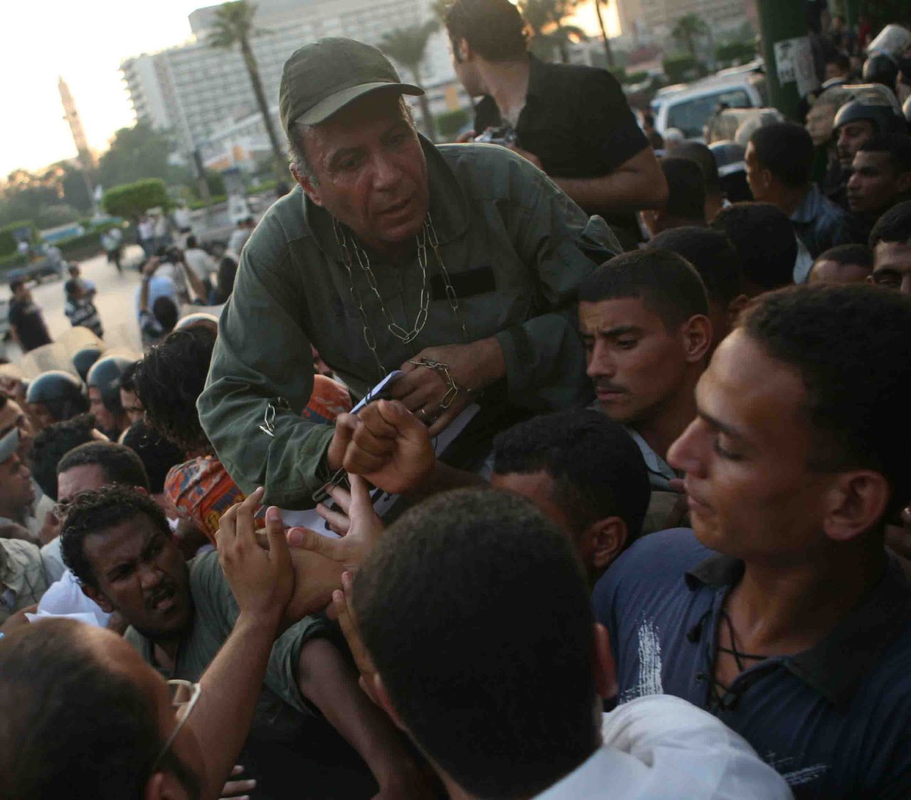 Kefaya activist Hamdi Qenawi dressed as an Egyptian army soldier in chains, mocking the Arab regimes' incapability of military action against Israel (Photo by Amr Abdallah, 26 July 2006)