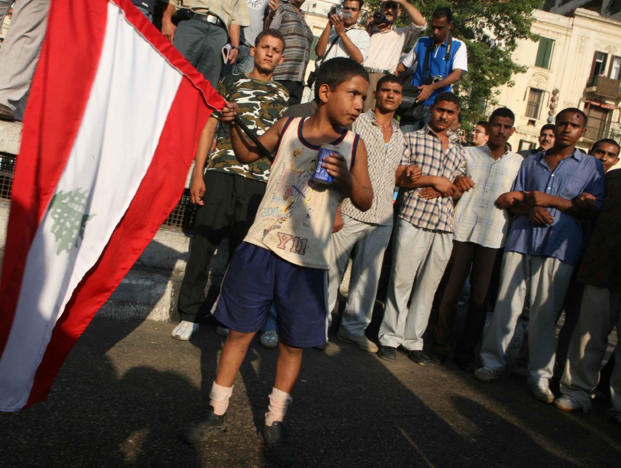 Child waving a Lebanese flag in Tahrir Square (Photo by Amr Abdallah, 26 July 2006)