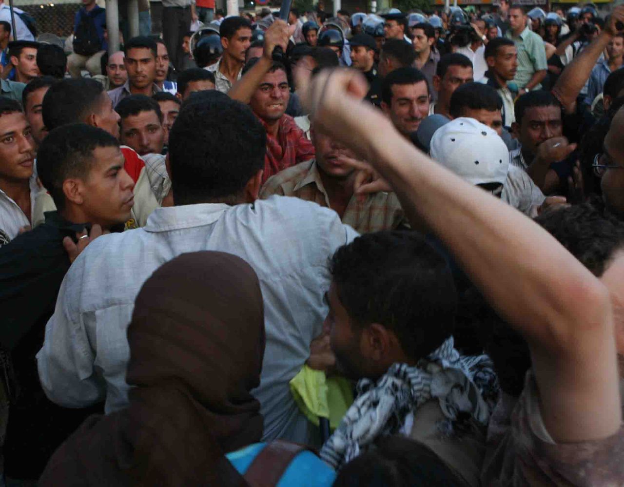 Thugs attacking protesters in Tahrir Sq (Photo by Amr Abdallah, 26 July 2006)